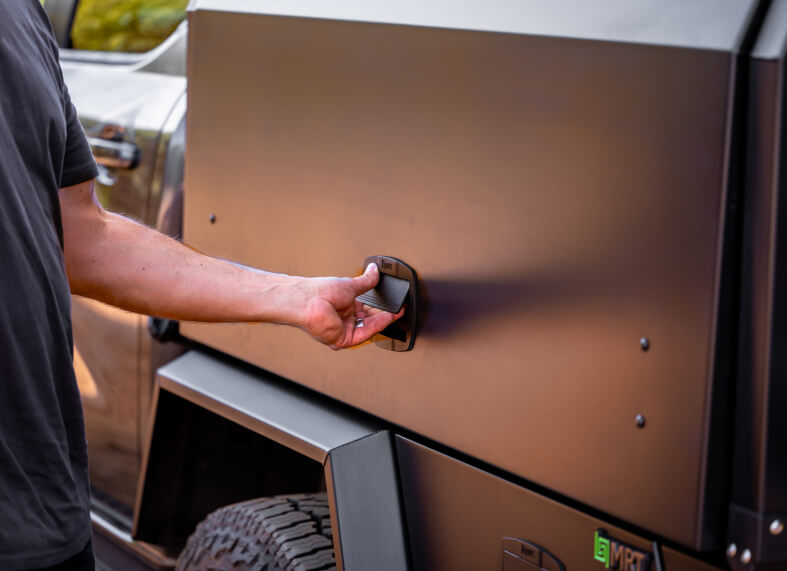 man opening a ute canopy