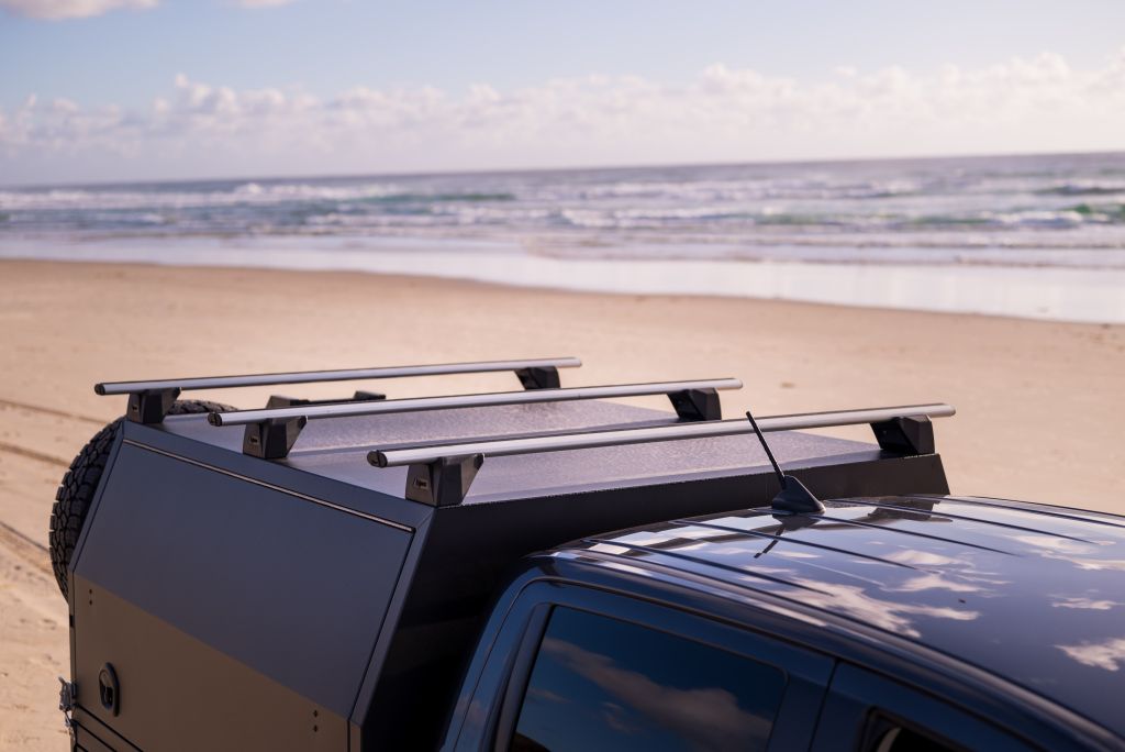 roof racks on MRT ute canopy at the beach ready for surf boards