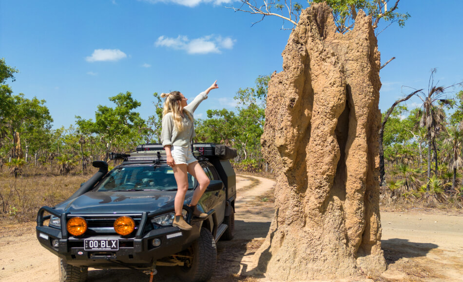 em from borderland explorers standing on a ute at the tjaynera falls