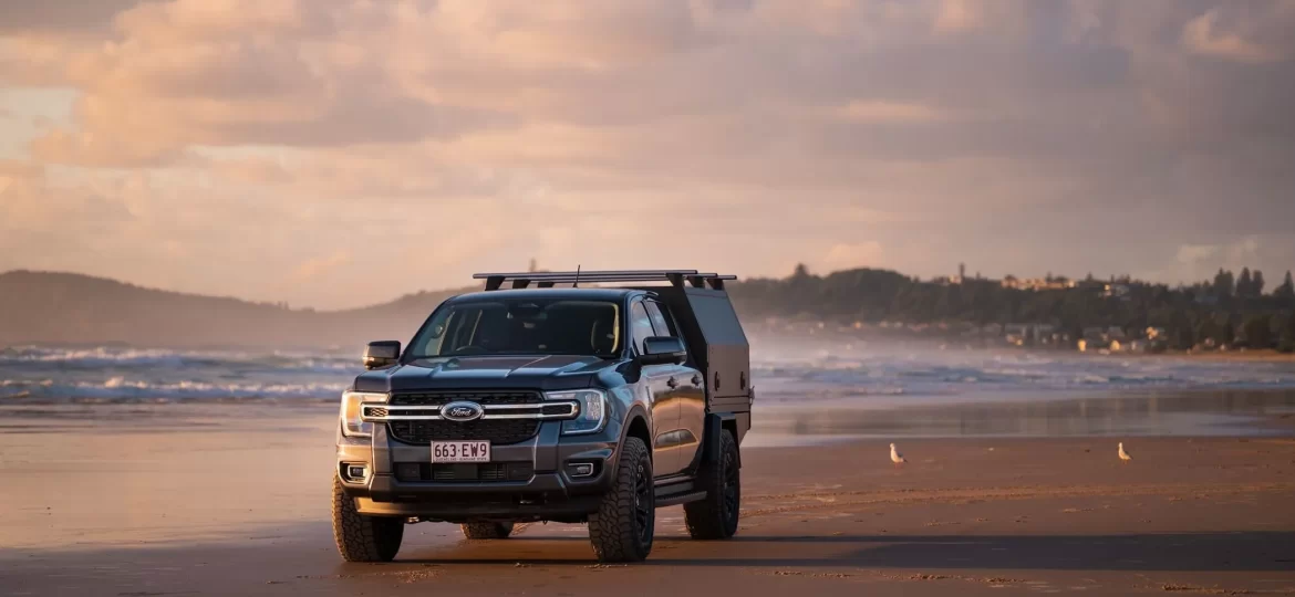 Ute on the beach in Australia with a Ute Canopy ready to explore
